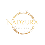 gold circular design with the brand name Nadzura going through the center of the circle with skin care at the bottom 